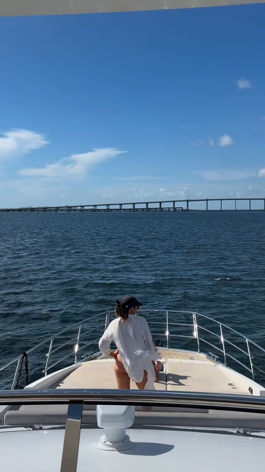 Guest on the bow of a yacht