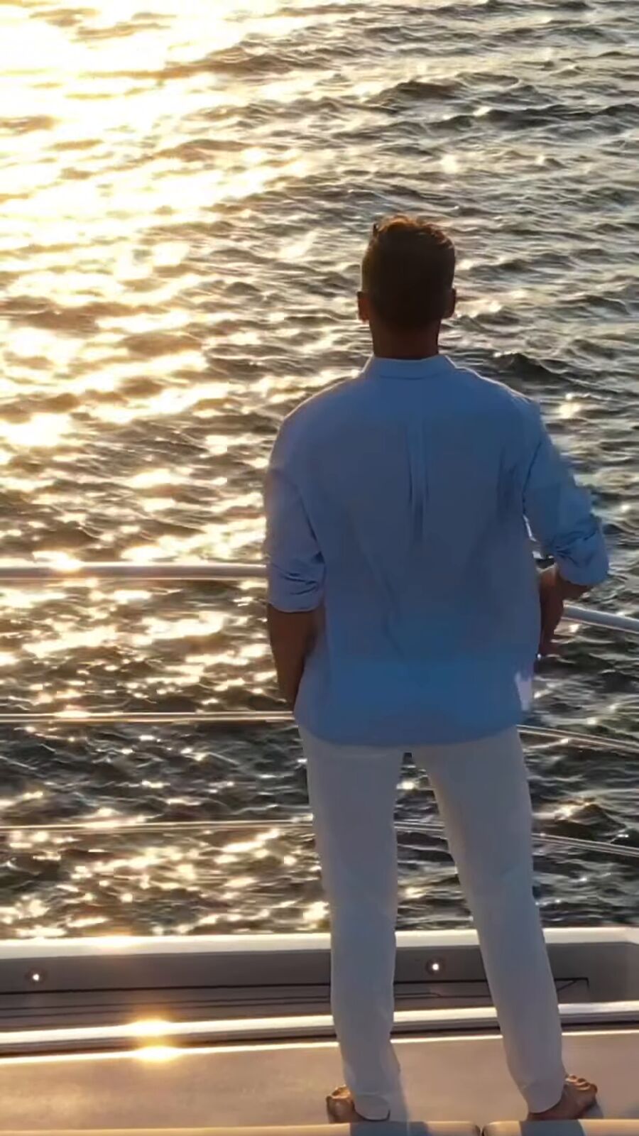 Guest watching the sunset from the deck
