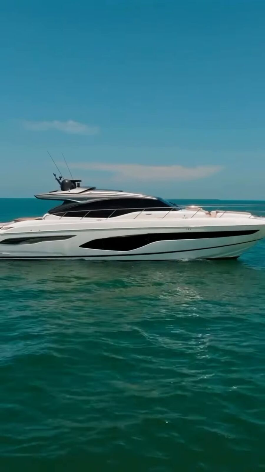 White yacht cruising